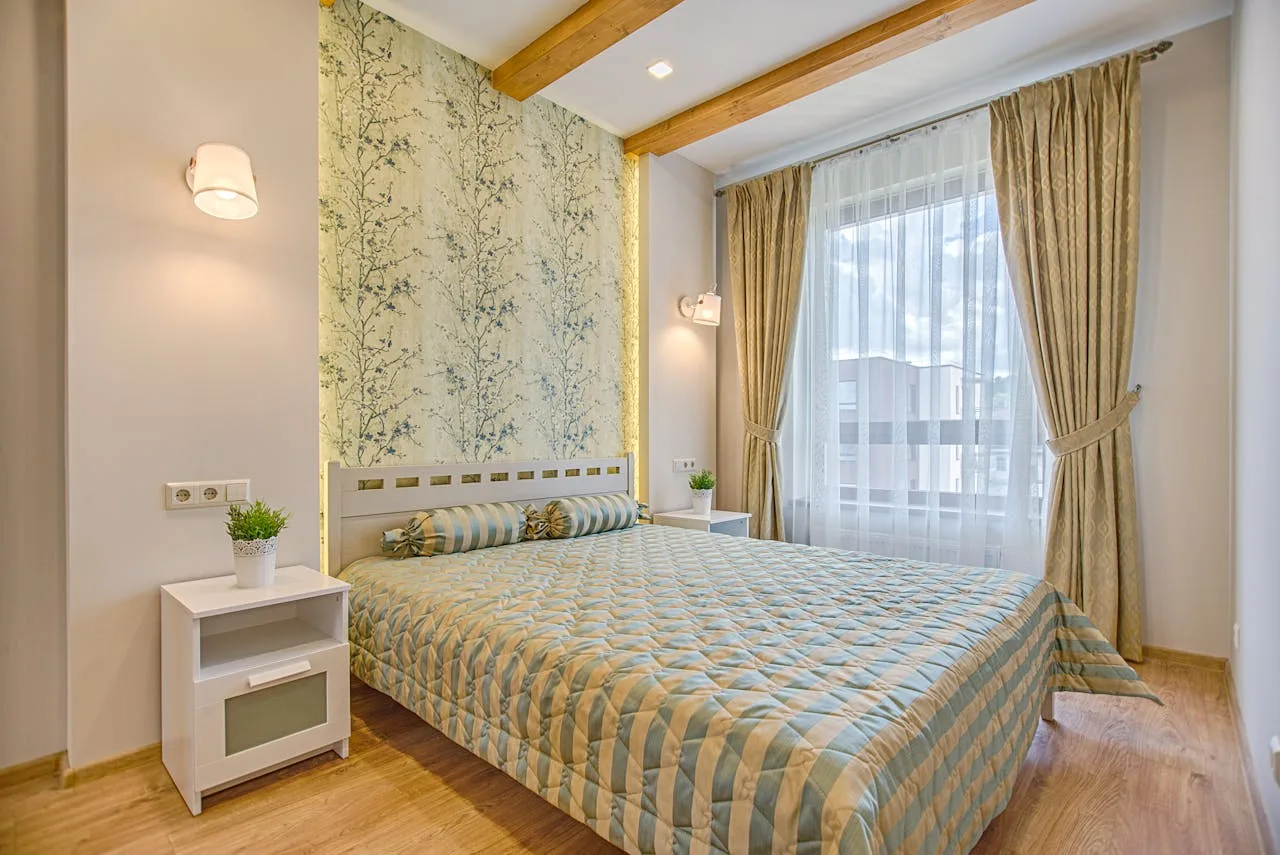 Residential wallpaper installation in Atlanta bedroom with floral accent wall